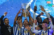 FC Porto players celebrate with the trophy after winning the Portuguese Candido de Oliveira Supercup soccer match against Benfica (2-0), held at Aveiro Municipal Stadium, in Aveiro, Portugal, 23 December 2020. JOSE COELHO/LUSA