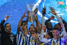 FC Porto players celebrate with the trophy after winning the Portuguese Candido de Oliveira Supercup soccer match against Benfica (2-0), held at Aveiro Municipal Stadium, in Aveiro, Portugal, 23 December 2020. JOSE COELHO/LUSA